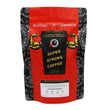 Load image into Gallery viewer, Front of a bag of Cannonball Coffee. The bag has a bright red background. In the centre is a black coffee cup with biceps bursting out of the sides. The cup says ‘Super Strong Coffee’ on it.