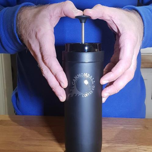 plunging coffee in the Espro Travel press